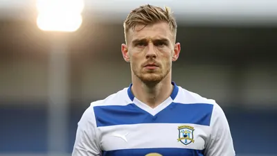 A photograph of Aaron Hopper, a 33-year-old Hartlepool FC player, filling the frame with a serious expression, taken at...