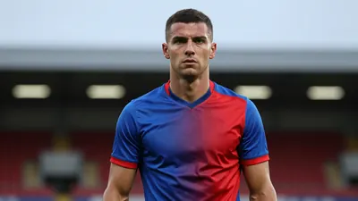 Mid-30s muscular striker, head-and-shoulders, solemn expression, short dark hair, faint scar on left cheek, eyes focused...